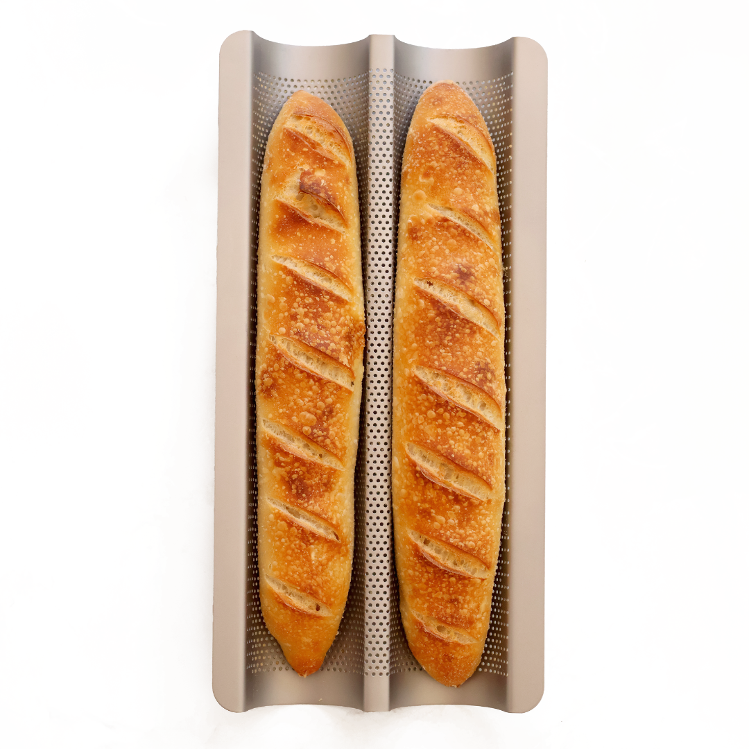 Non-stick baguette tray for baking baguettes